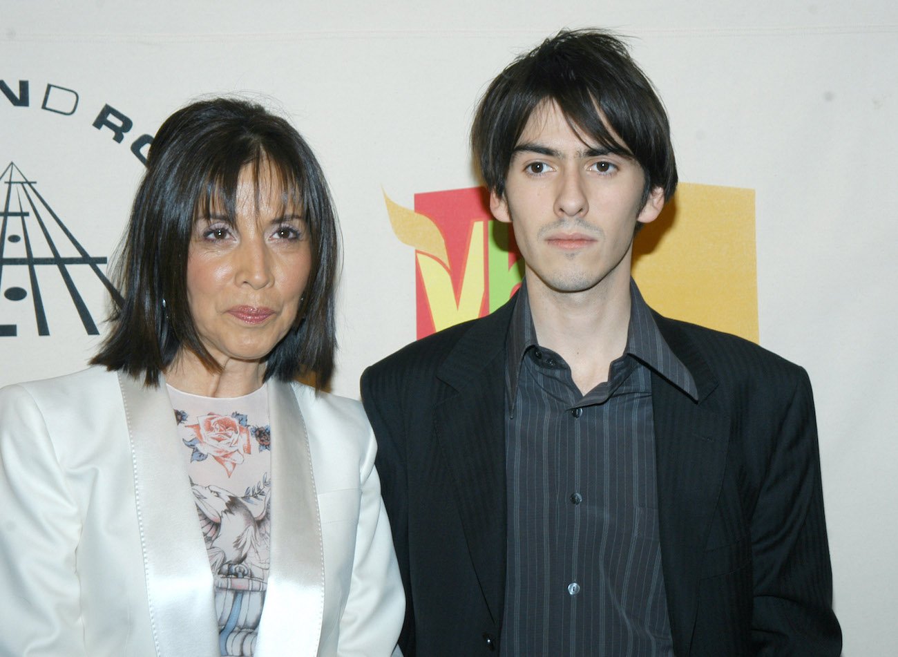 George Harrison's son, Dhani, and his mother, Olivia, at George's Rock & Roll Hall of Fame induction in 2004.
