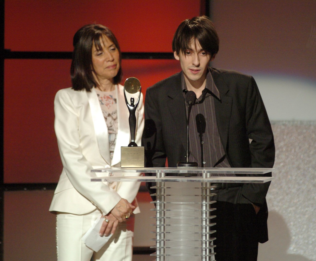 George Harrison's widow, Olivia, and their son, Dhani, at George's Rock & Roll Hall of Fame induction in 2004.