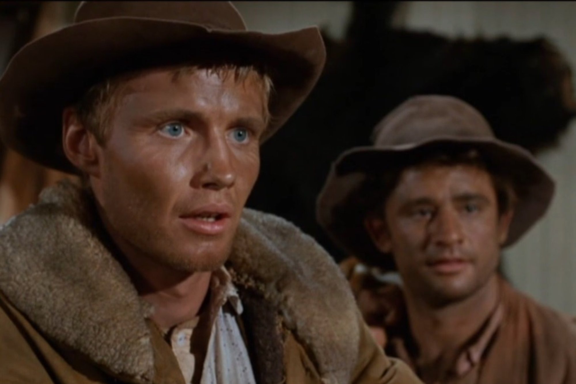 'Gunsmoke' Jon Voight as Cory and Lou Antonio as Rich wearing Western clothing looking surprised