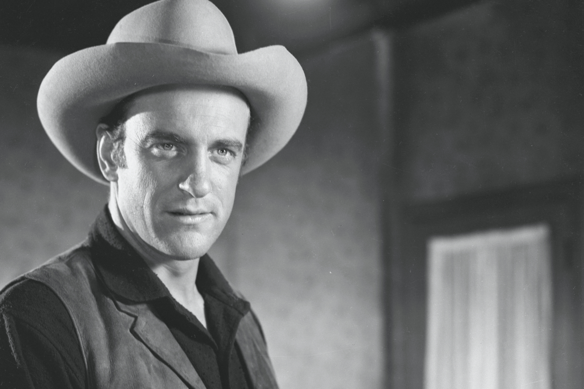 'Gunsmoke' actor James Arness as U.S. Marshal Matt Dillon in a black-and-white picture wearing a cowboy hat