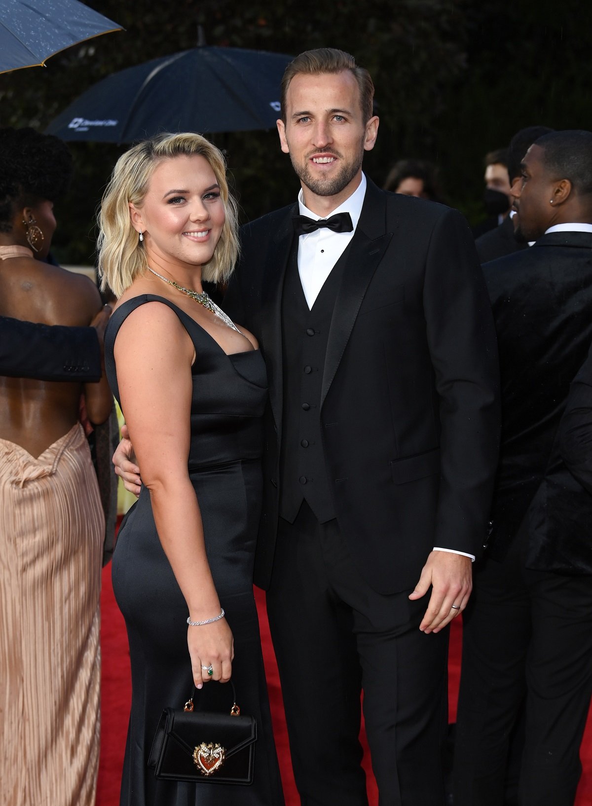 Harry Kane and Katie Goodland pose for photos at the No Time To Die world premiere