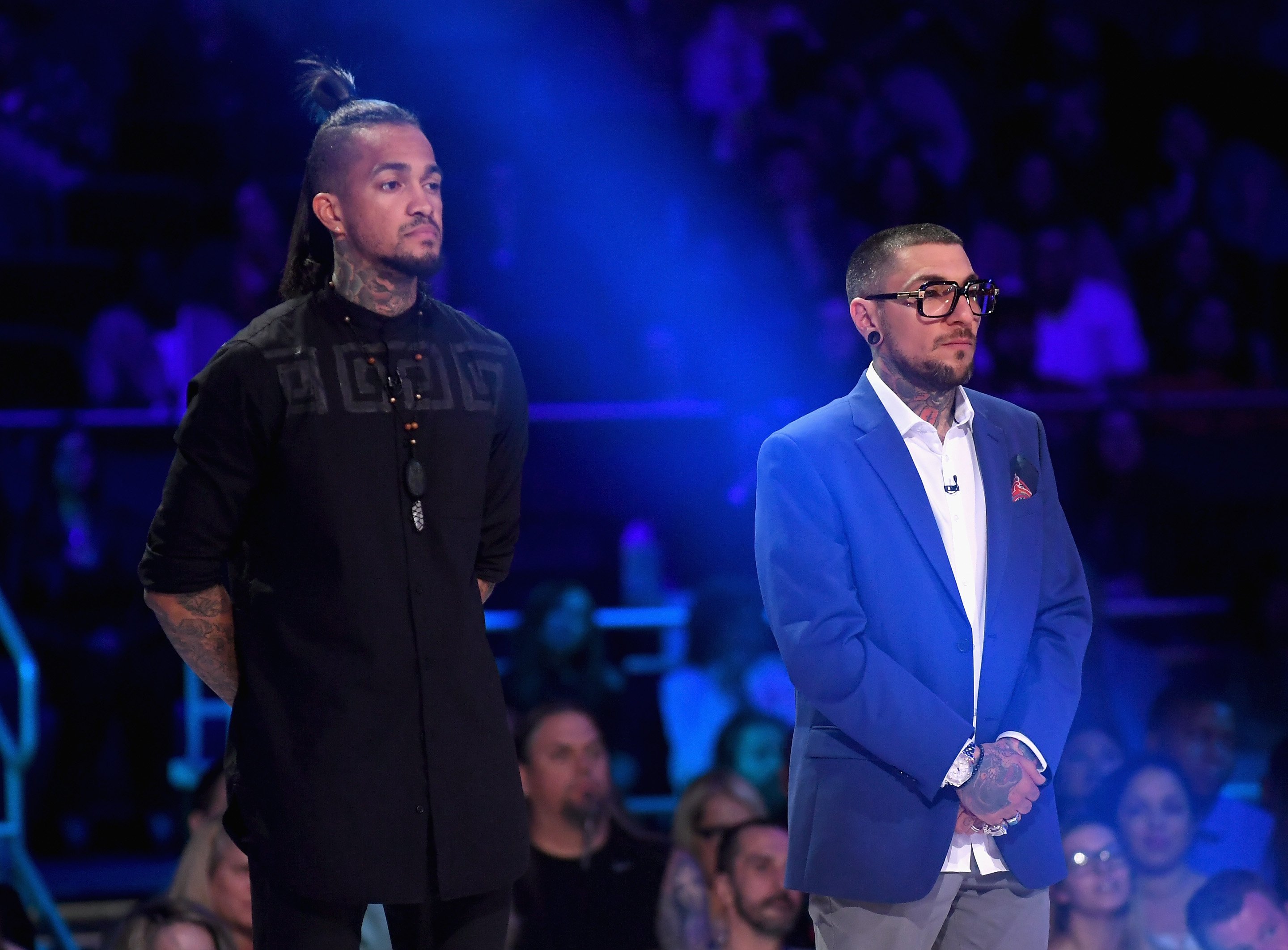 Anthony Michaels (L) and DJ Tambe stand onstage during the Ink Master Season 10 Finale