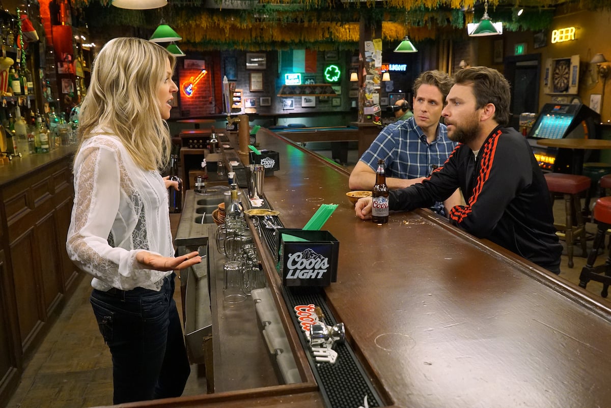'It's Always Sunny in Philadelphia': Kaitlin Olson stands behind the bar which Glenn Howerton and Charlie Day sit at