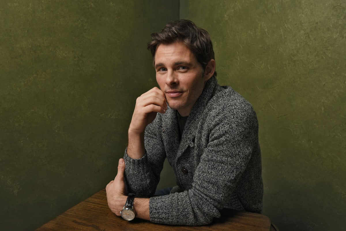 James Marsden smiling, leaning his head on his hand