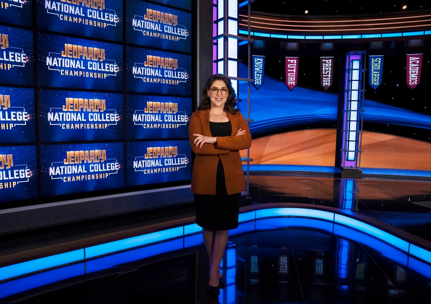 Mayim Bialik stands in front of the Jeopardy! board during the 'national College Championship'
