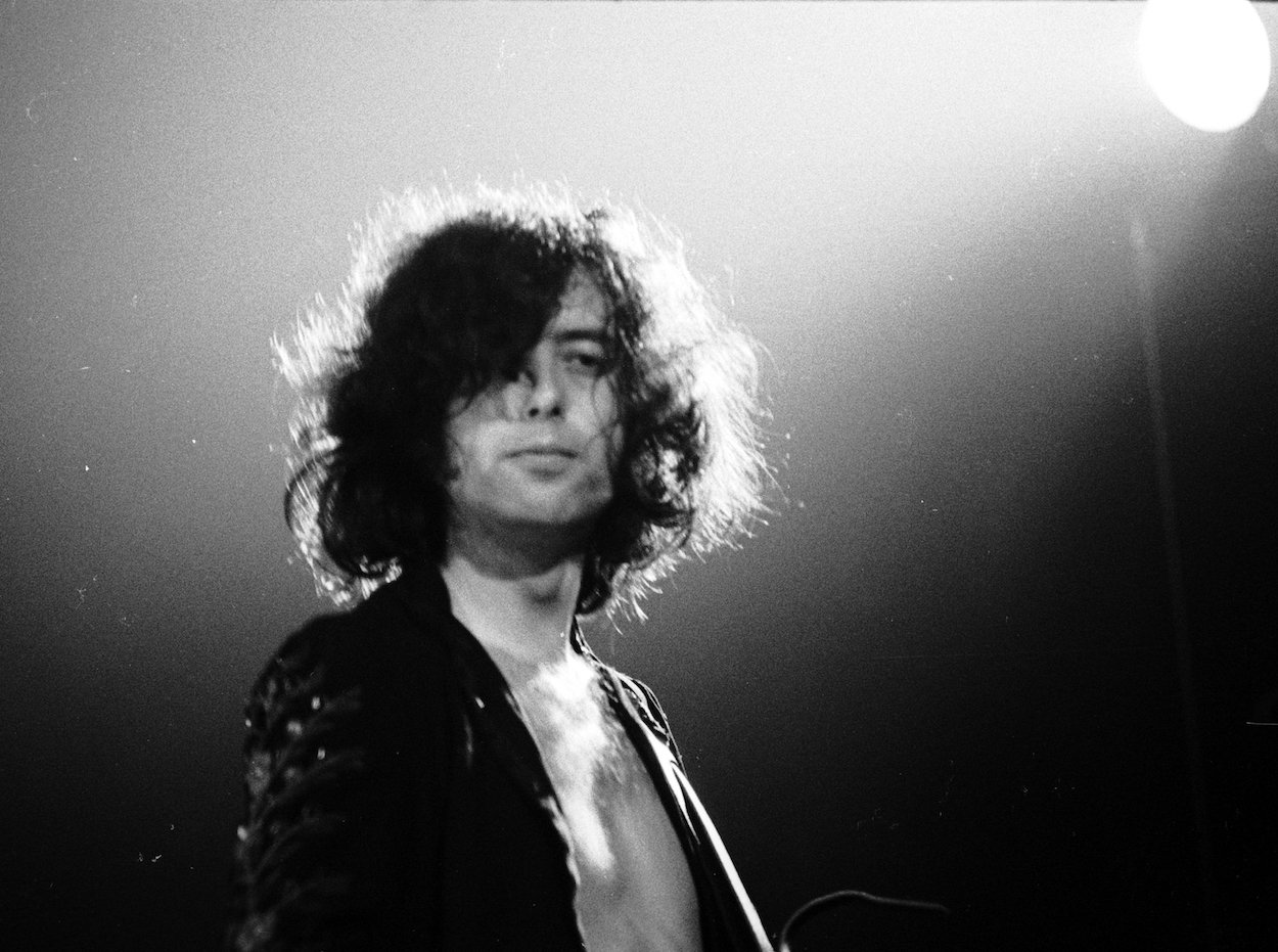 Led Zeppelin guitarist Jimmy Page, who hated the Zep song 'Living Loving Maid,' in concert circa 1970.