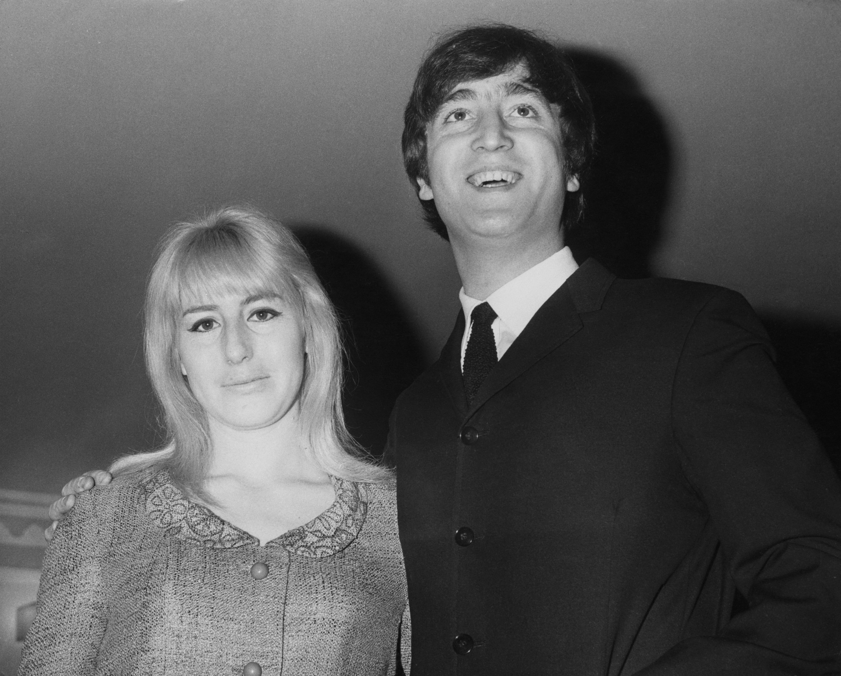 Musician, singer and songwriter John Lennon (1940 - 1980) of British rock group the Beatles with his first wife Cynthia during the launch of his book 'In His Own Write'
