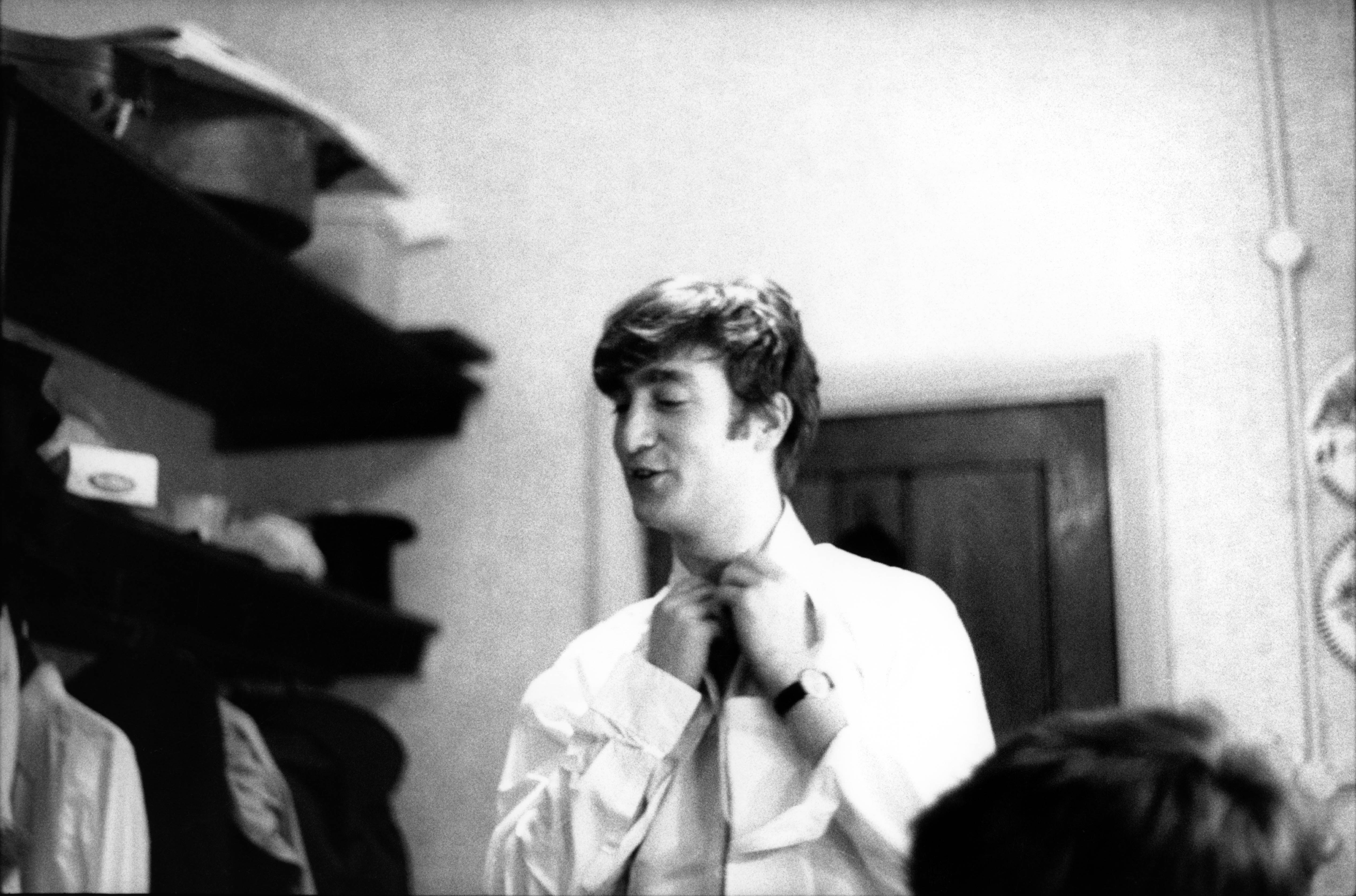 John Lennon (1940-1980) from The Beatles posed backstage at the Finsbury Park