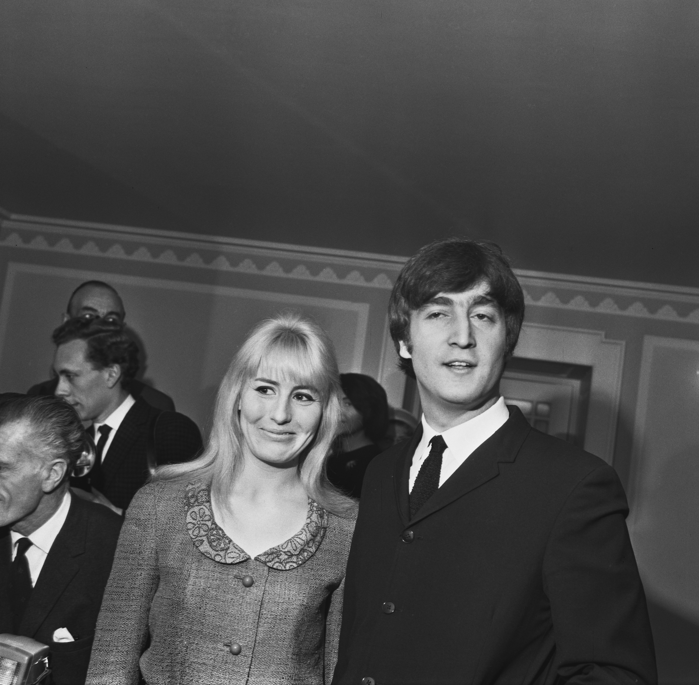 English musician John Lennon (1940 - 1980) of the Beatles with his wife Cynthia at the launch of his book 'In His Own Write'