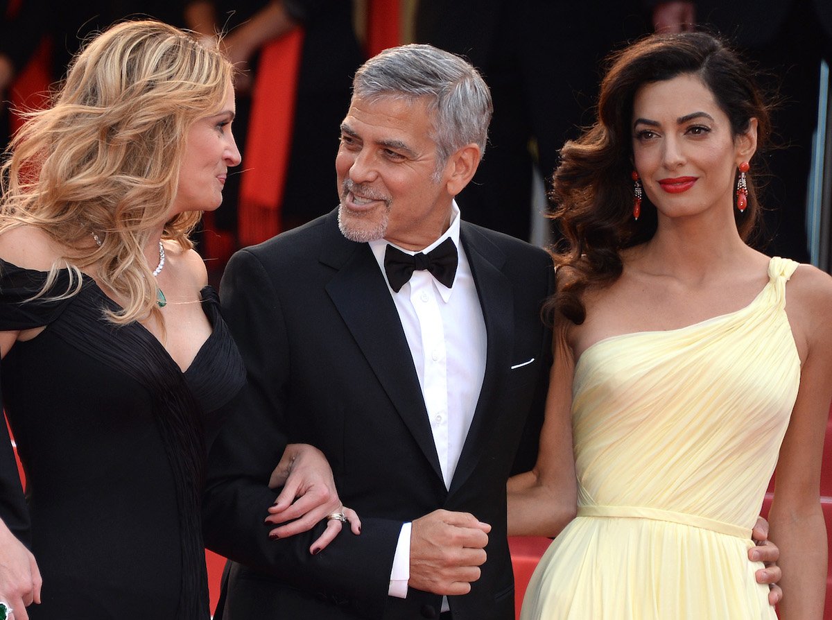 Julia Roberts, George Clooney and Amal Clooney attend the 'Money Monster' premiere at the 69th annual Cannes Film Festival