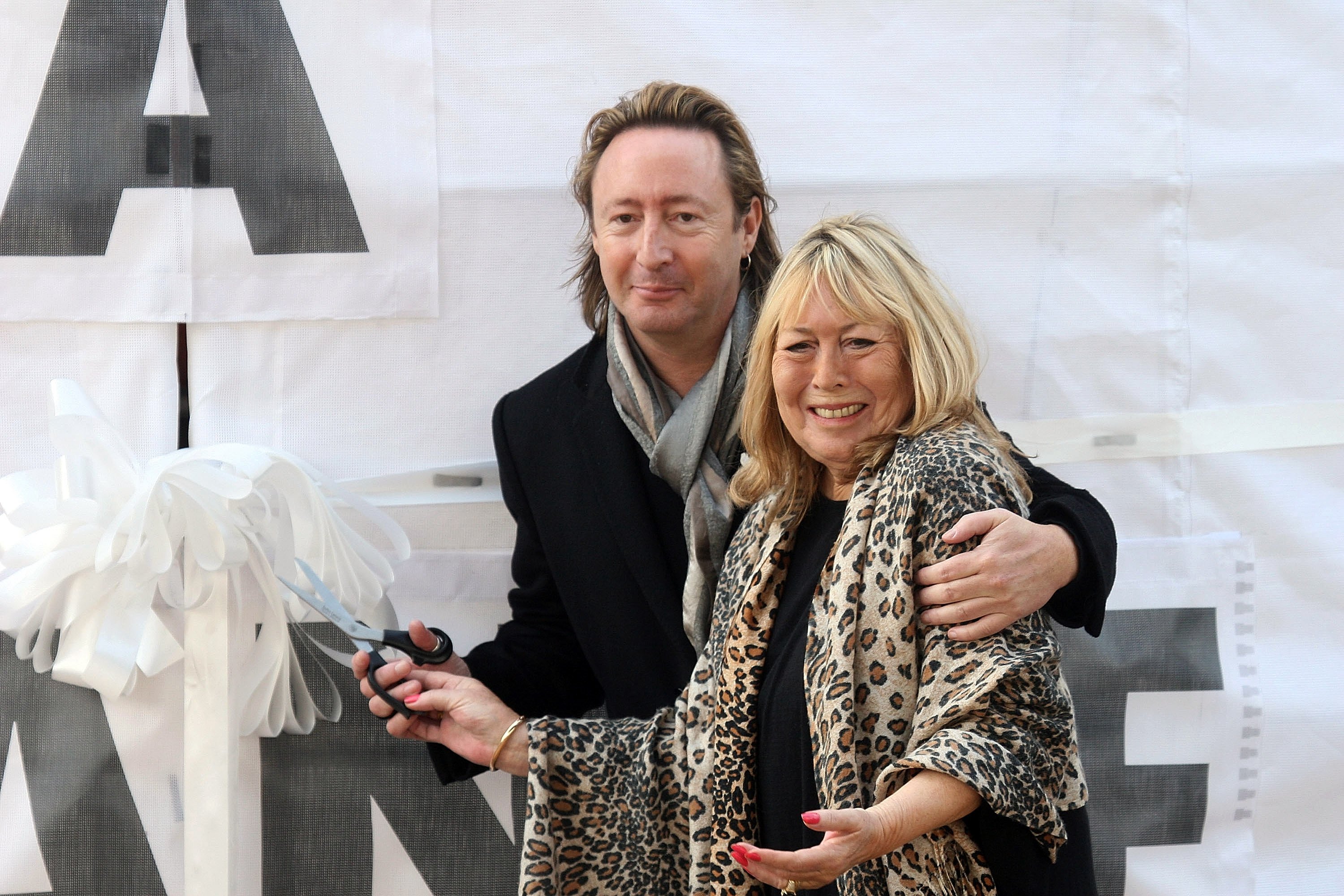 Julian Lennon and Cynthia Lennon, the son and first wife of John Lennon, attend the unveiling of the John Lennon monument