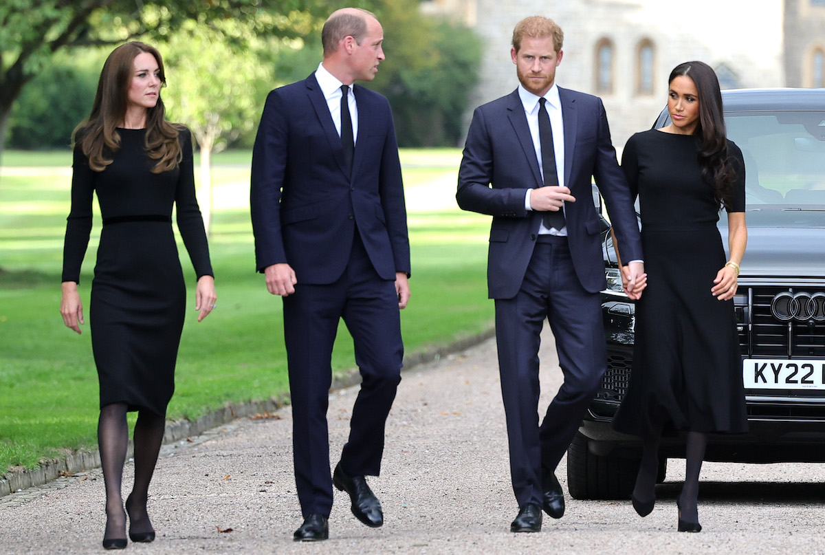 Kate Middleton, Prince William, Prince Harry, and Meghan Markle, whose gala appearances in December 2022 tell the 'Sussex story in a nutshell' according to a commentator, walk together wearing black and navy