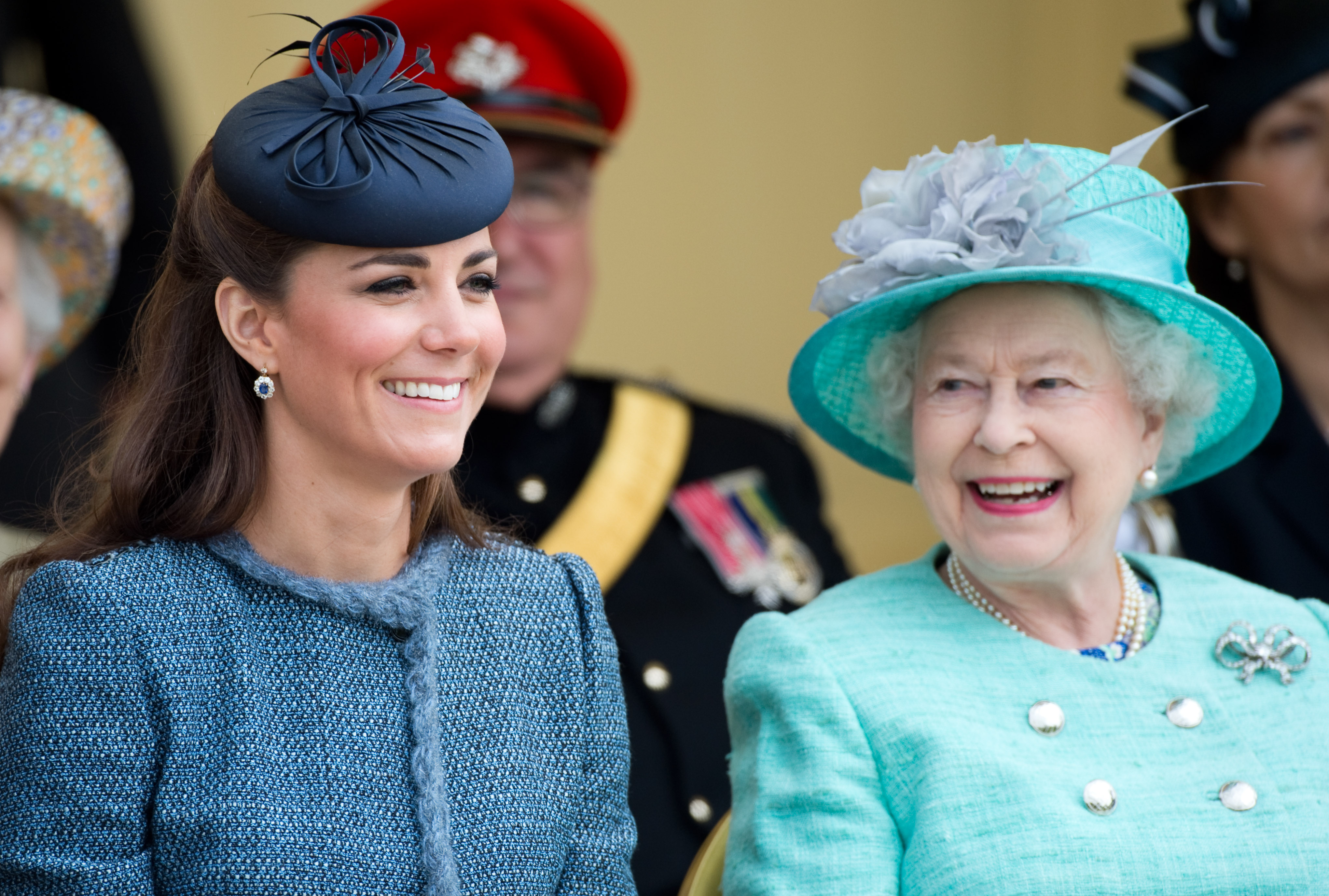 Kate Middleton and Queen Elizabeth II enjoy a laugh.