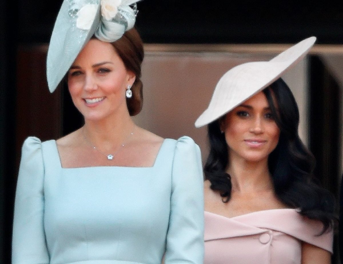 Kate Middleton and Meghan Markle, who were both given jewelry from the late Queen Elizabeth, standing on the balcony of Buckingham Palace during Trooping The Colour 2018