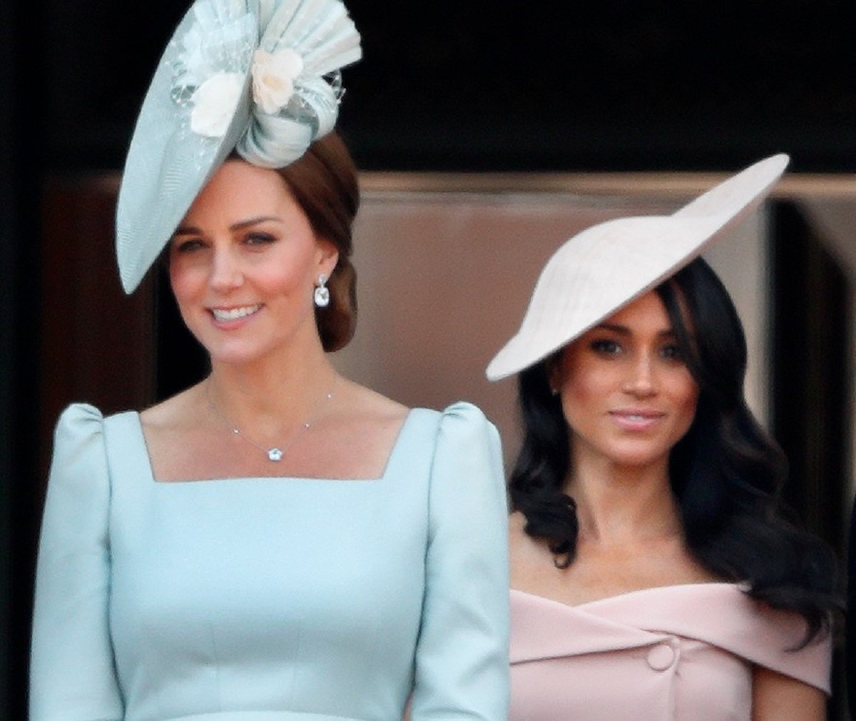Kate Middleton and Meghan Markle, who were both given jewelry from the late Queen Elizabeth, standing on the balcony of Buckingham Palace during Trooping The Colour 2018