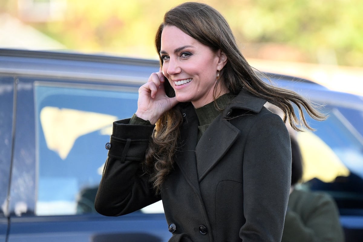 Kate Middleton, who appeared 'so natural and un-regal' to body language expert Judi James as she chatted with Akeem, 3, outside Colham Manor Children's Centre on Nov. 9, 2022