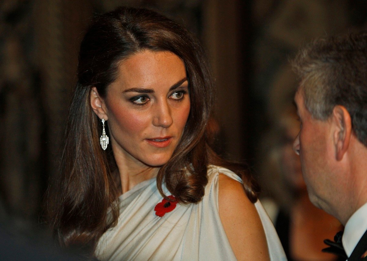 Kate Middleton, who was once ignored at a royal party when no noticed her, talks with people at a reception of the National Memorial Arboretum Appeal at St James's Palace