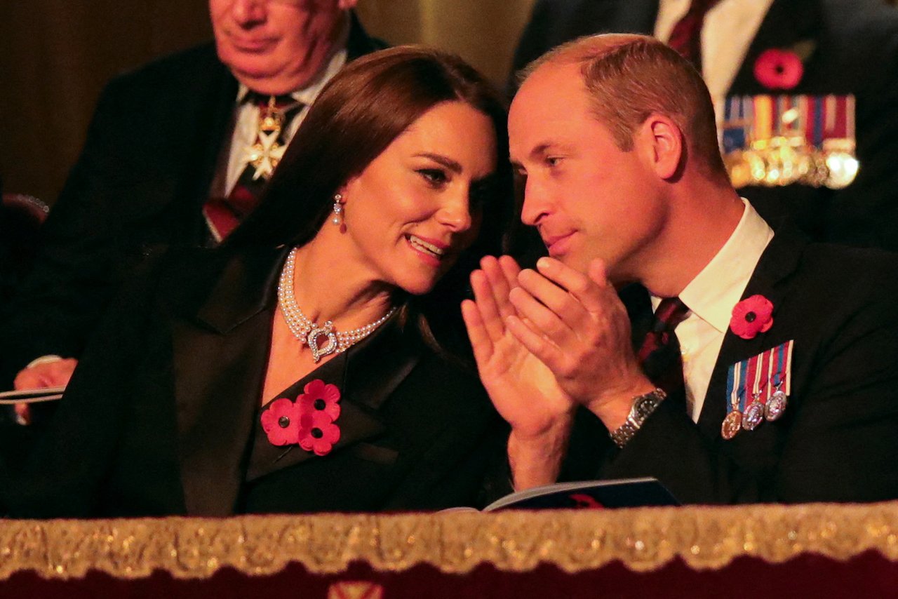 Kate Middleton, Princess of Wales, (L) Britain's Prince William, Prince of Wales (R) attend the annual Royal British Legion Festival of Remembrance at the Royal Albert Hall in London on November 12, 2022.