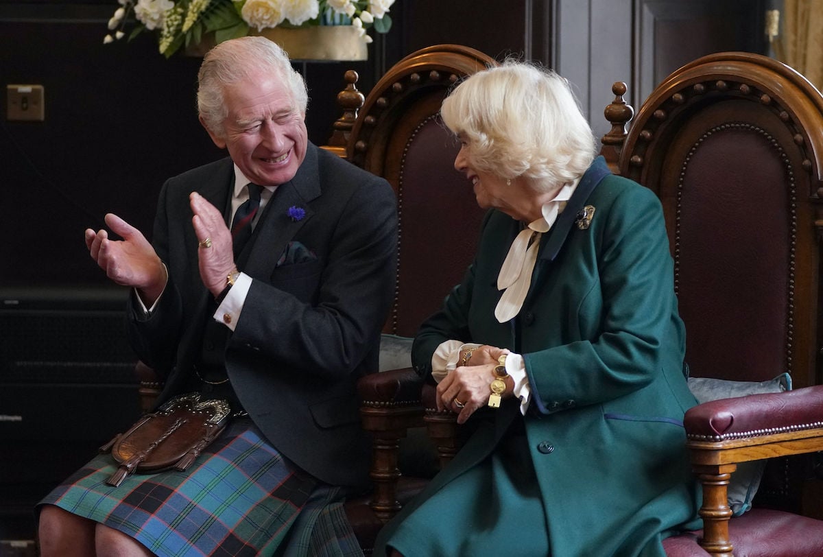 King Charles and Camilla Parker Bowles, Queen Consort smile at each other