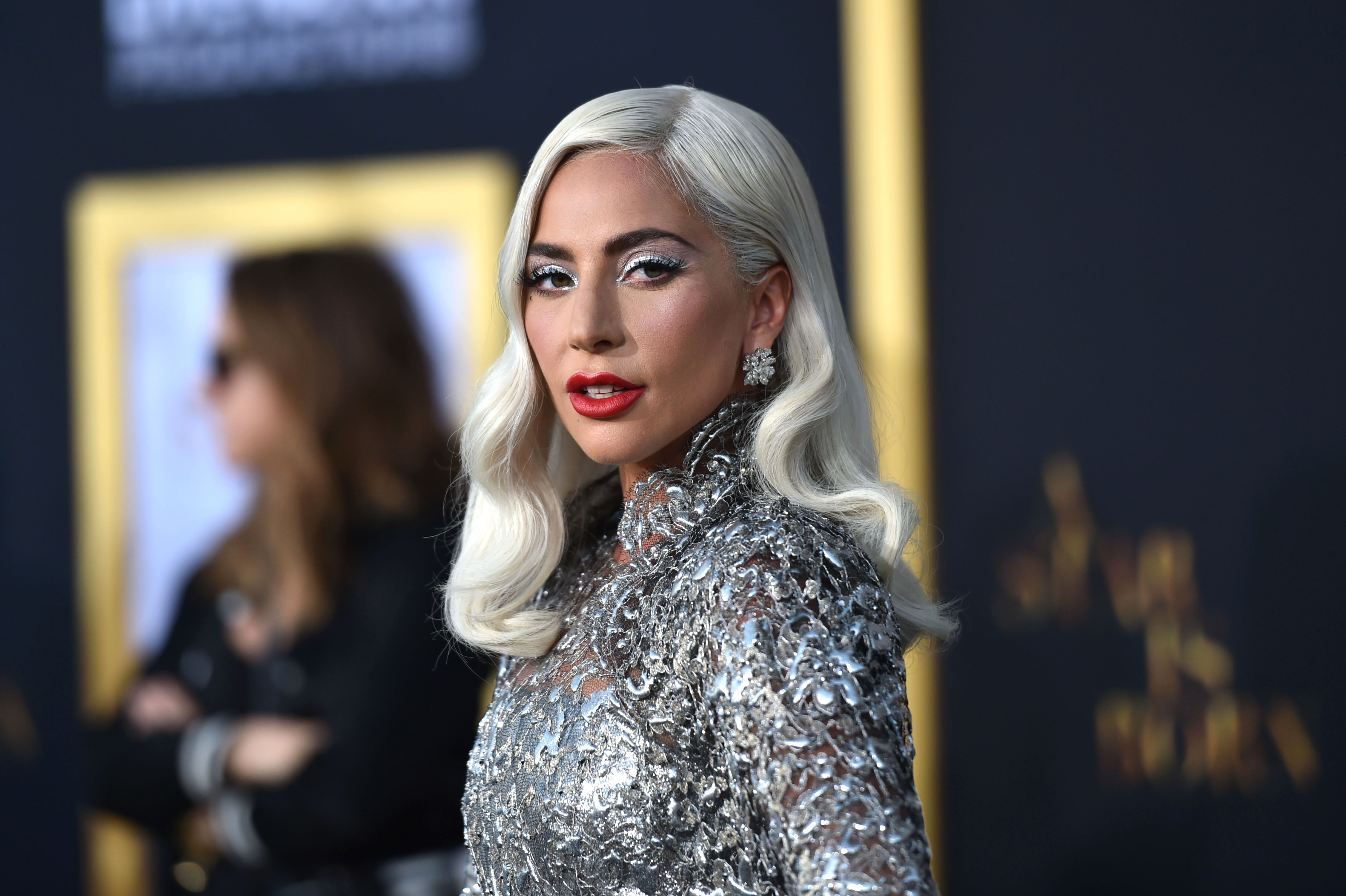 Lady Gaga wearing a silver outfit