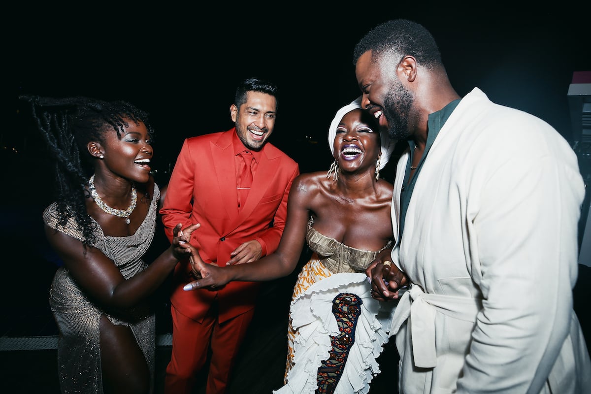 Lupita Nyong'o, Tenoch Huerta, Danai Gurira, and Winston Duke laugh during the Black Panther tour in Lagos, Nigeria