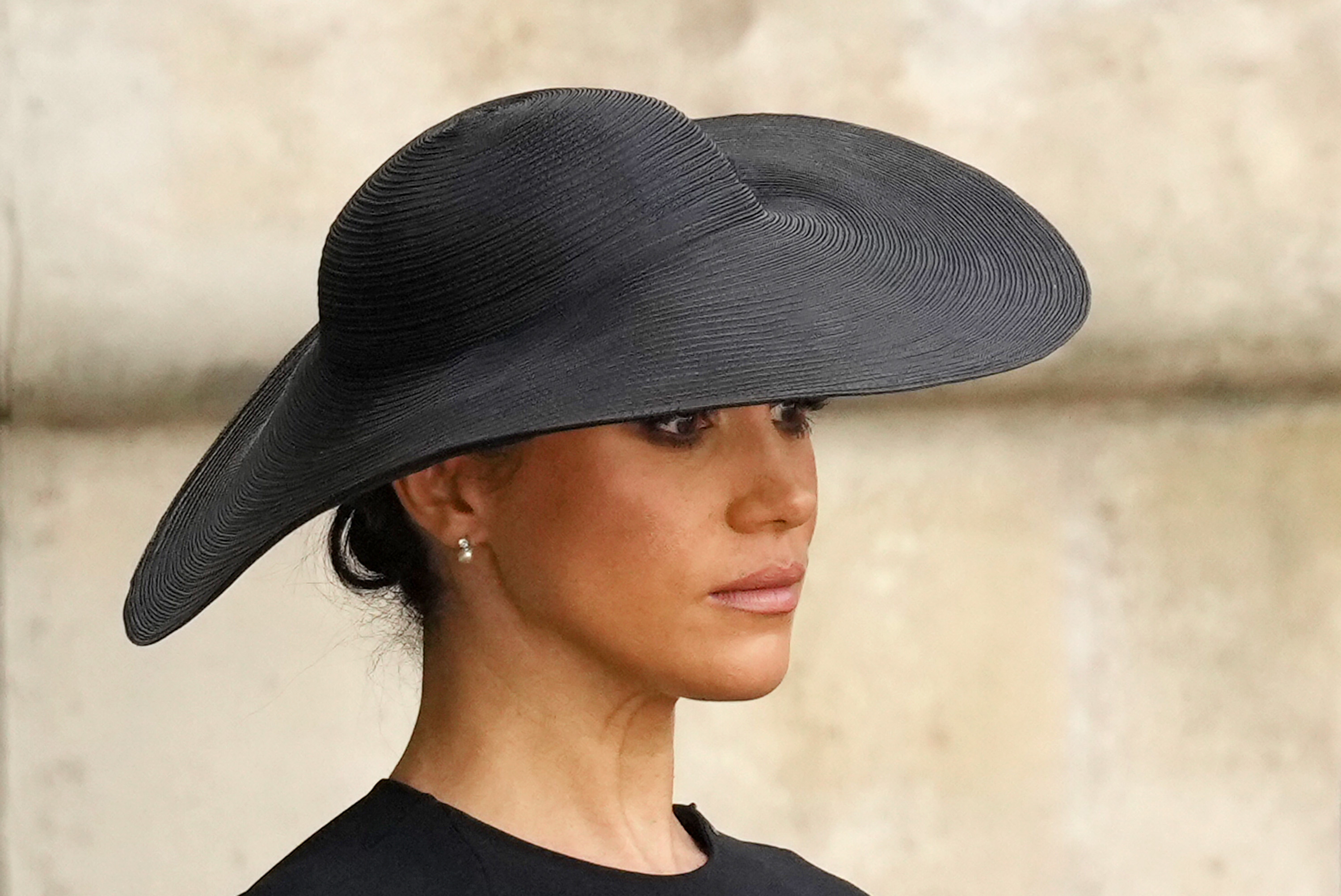 Meghan Markle is photographed at Westminster Abbey during The State Funeral of Queen Elizabeth II