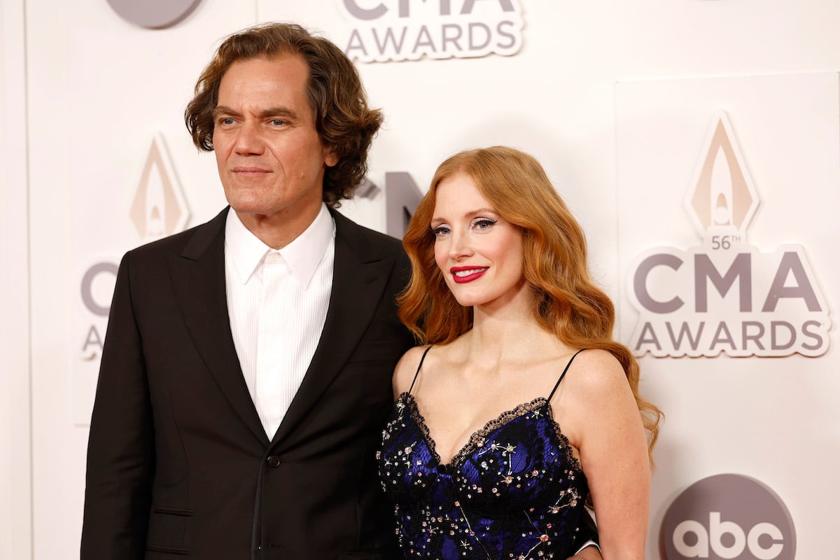Michael Shannon and Jessica Chastain pose for photos at the 2022 CMA Awards