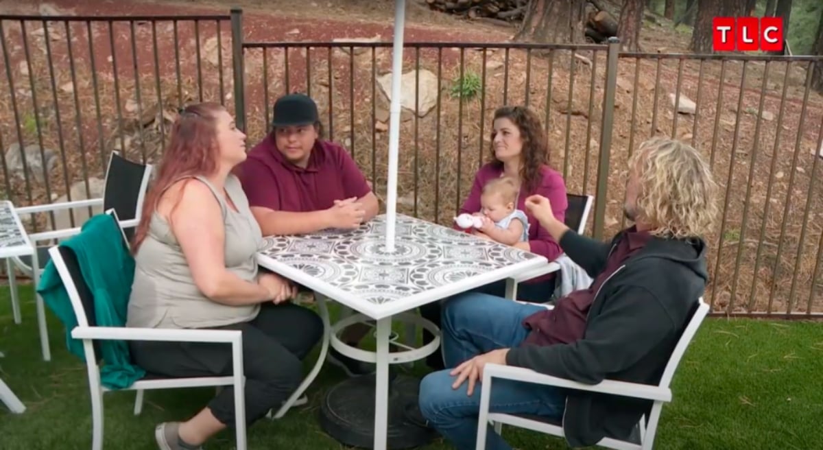 Mykelti Padron, Tony Padron, Robyn Brown, Avalon Padron, and Kody Brown sit down and talk outside in 'Sister Wives' Season 17 on TLC.