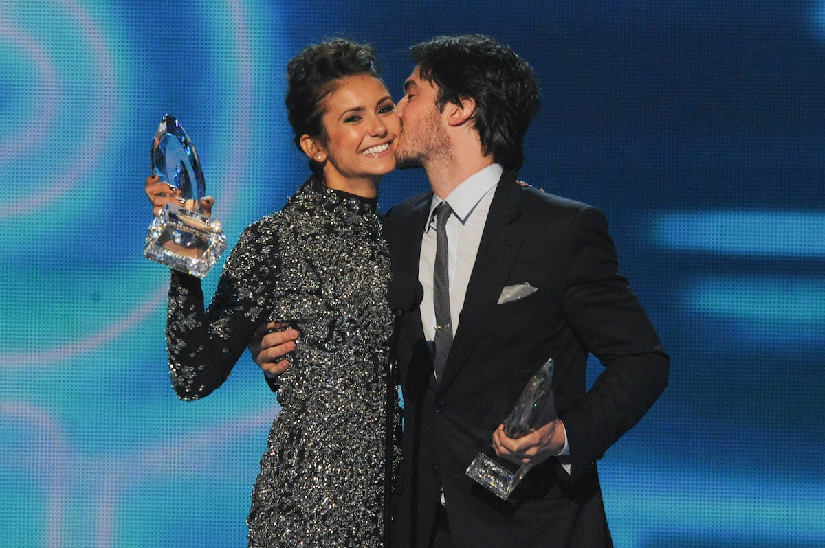 'The Vampire Diaries' star Ian Somerhalder kissing Nina Dobrev's cheek at an awards ceremony