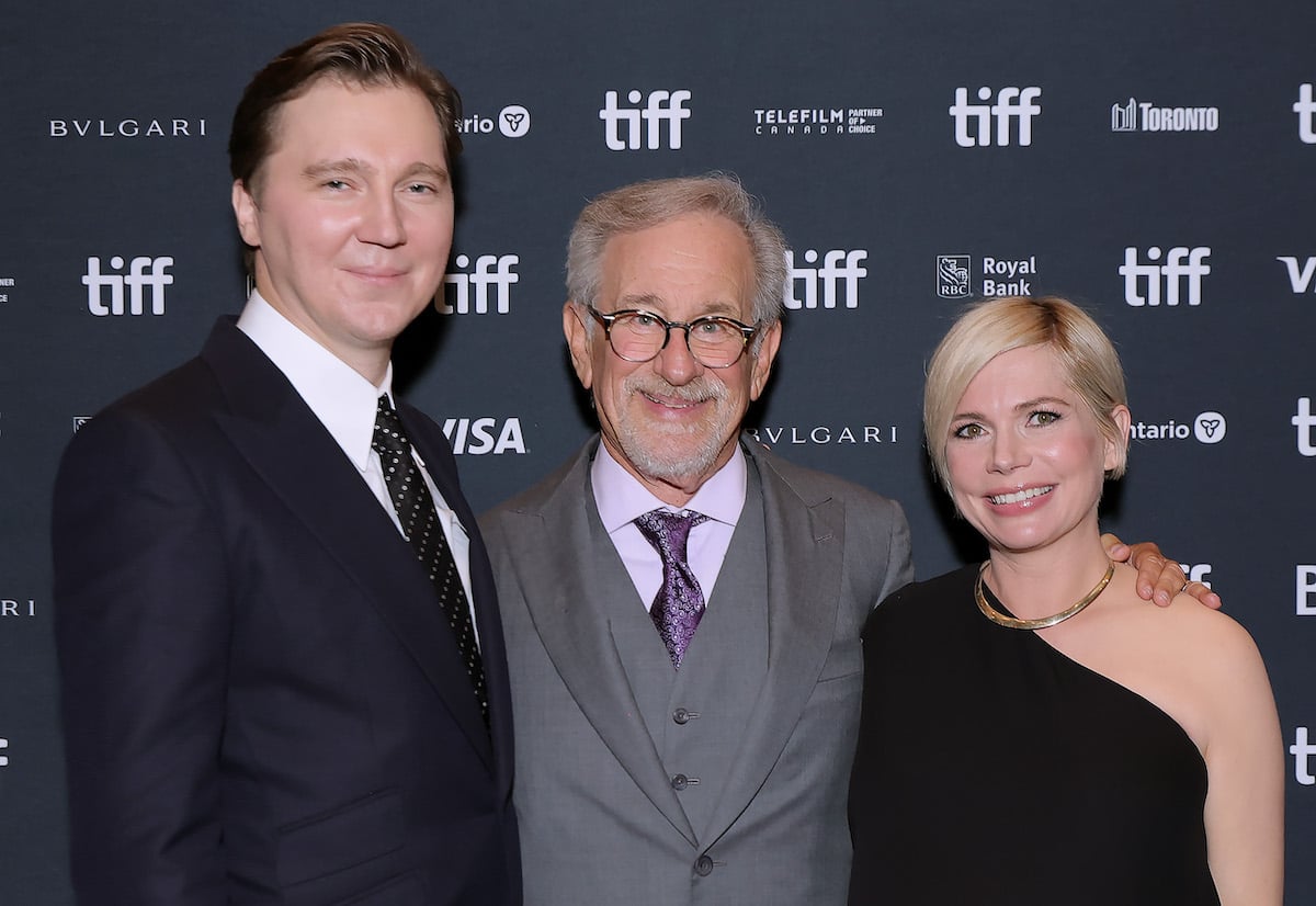 Paul Dano, Steven Spielberg, and Michelle Williams smile at the "The Fabelmans" premiere at the 2022 Toronto International Film Festival