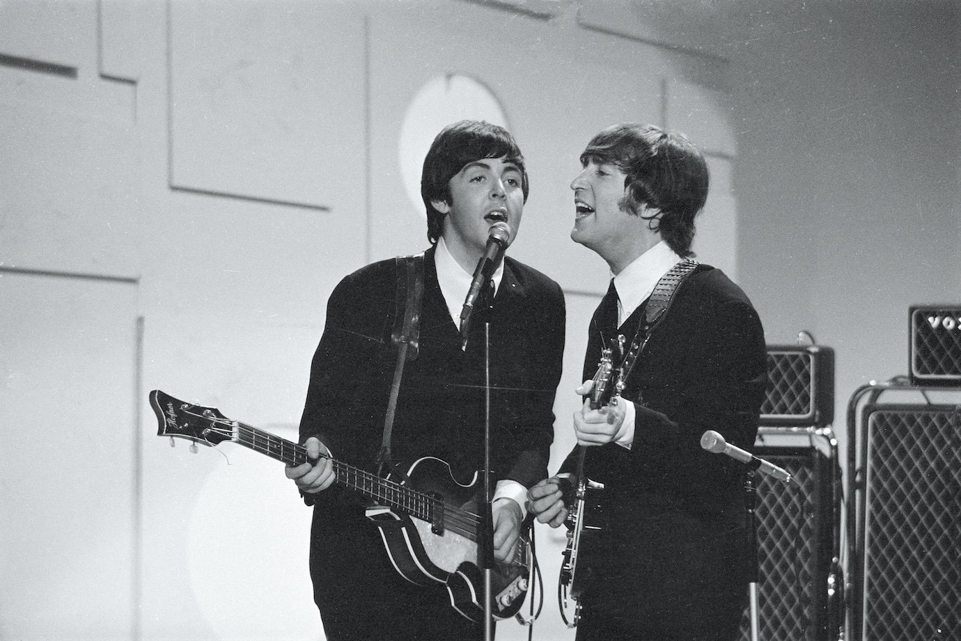 Paul McCartney and John Lennon of The Beatles appear on The Ed Sullivan Show