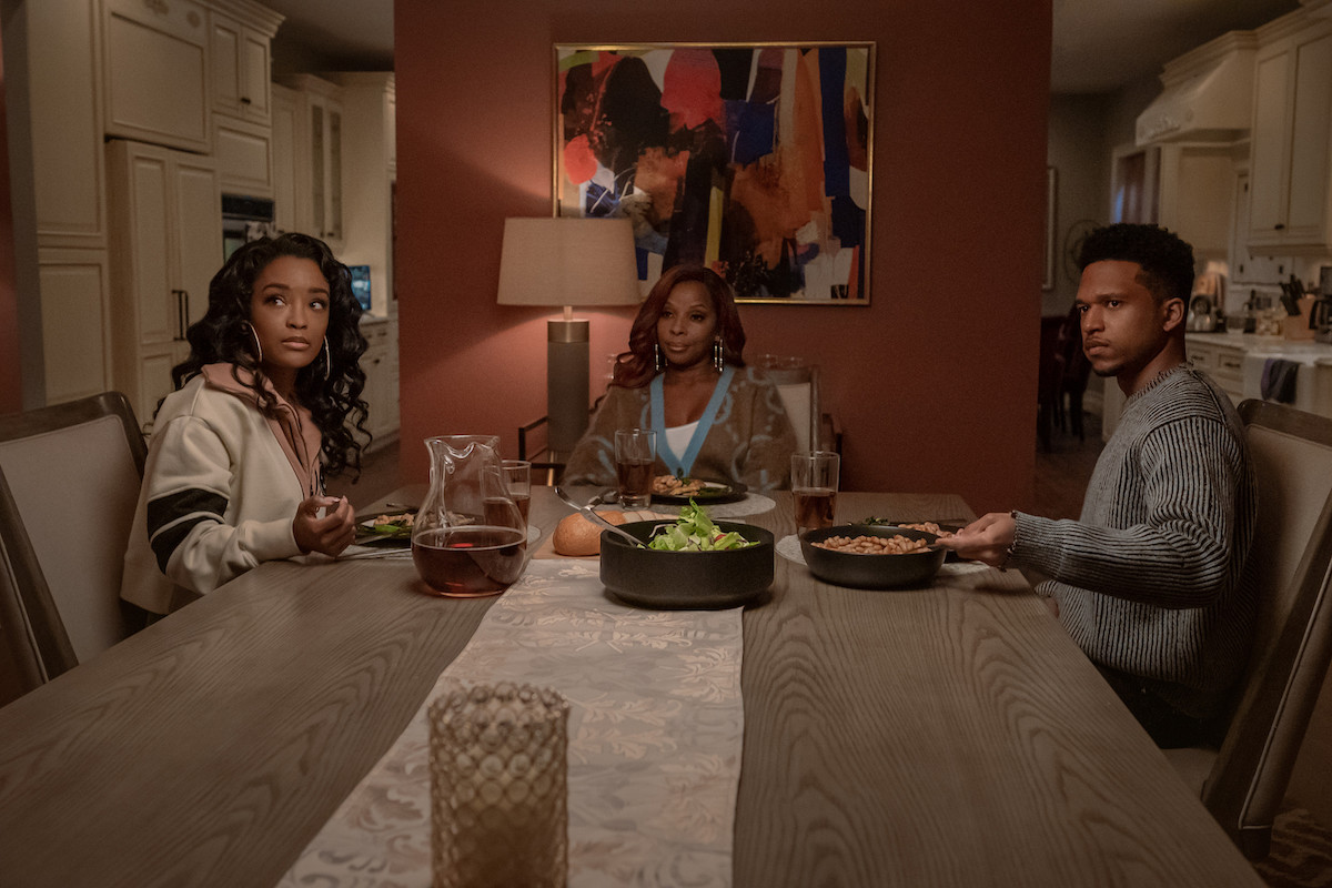LaToya Tonodeo as Diana, Mary J. Blidge as Monet and Lovell Adams-Gray as Dru sitting around the dinner table in 'Power Book II: Ghost'