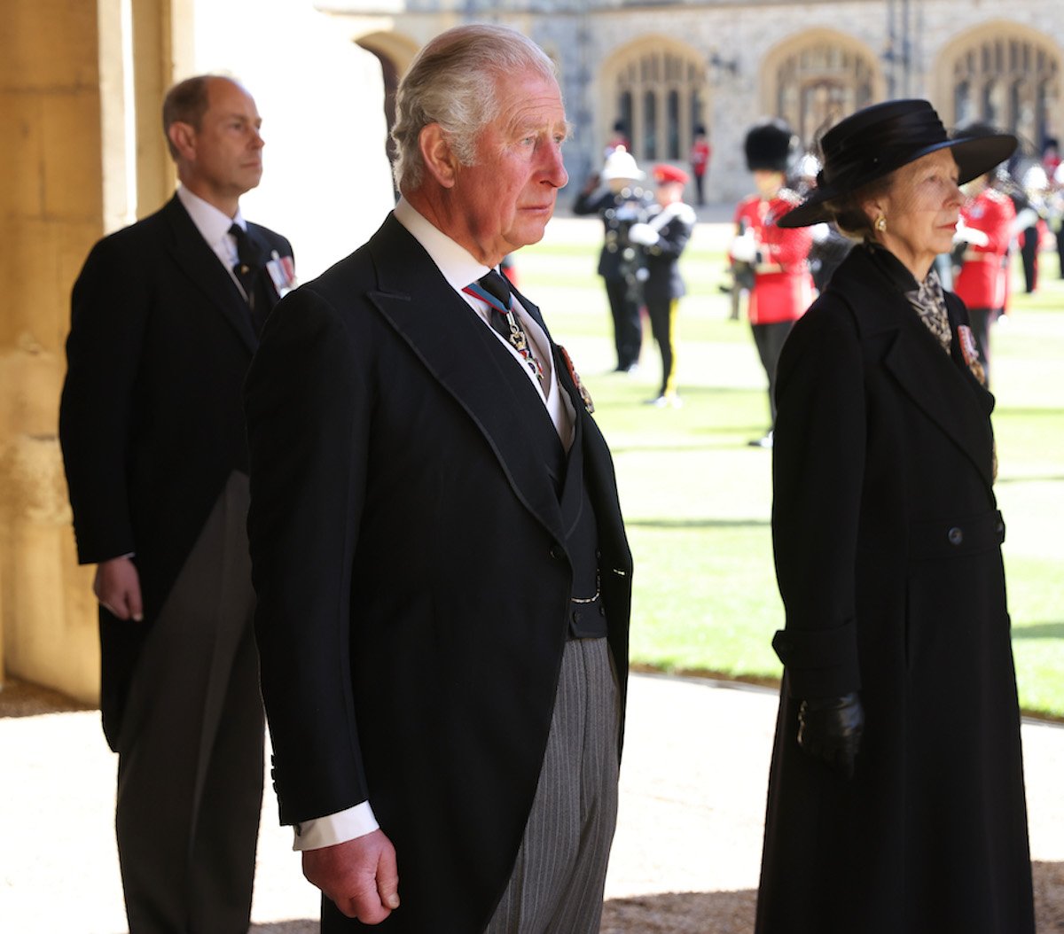 King Charles III, who shows he has 'total confidence' in Princess Anne and Prince Edward by requesting they becoming 'counsellors of state' according to a biographer, stand together wearing black
