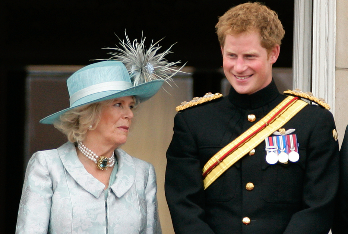 Camilla Parker Bowles, then Duchess of Cornwall, now queen consort and Prince Harry stand on the balcony of Buckingham Palace during the annual Trooping the Colour Ceremony at Buckingham Palace on June 16, 2012
