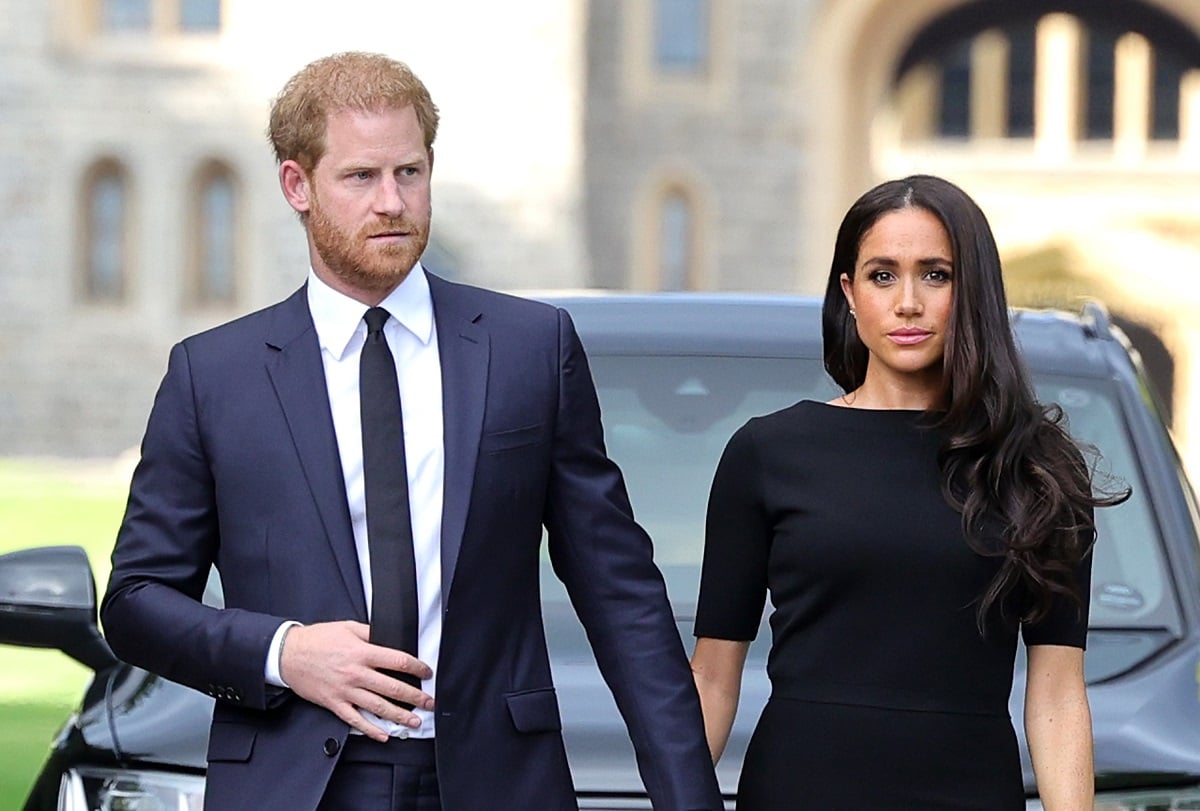 Prince Harry and Meghan Markle, who royal staffers have new nickname for now that they live in the U.S., arrive on the long Walk at Windsor Castle to view flowers and tributes to Queen Elizabeth II