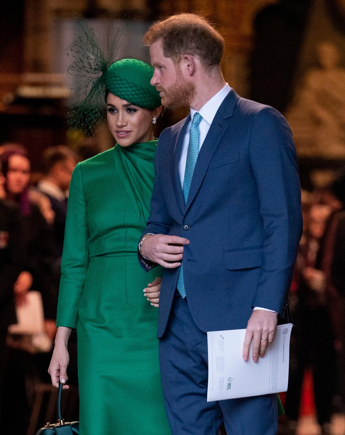 Prince Harry and Meghan Markle, who a body language expert says look like they 'haven't slept' and 'want to disappear,' pictured during their final royal engagement at Westminster Abbey