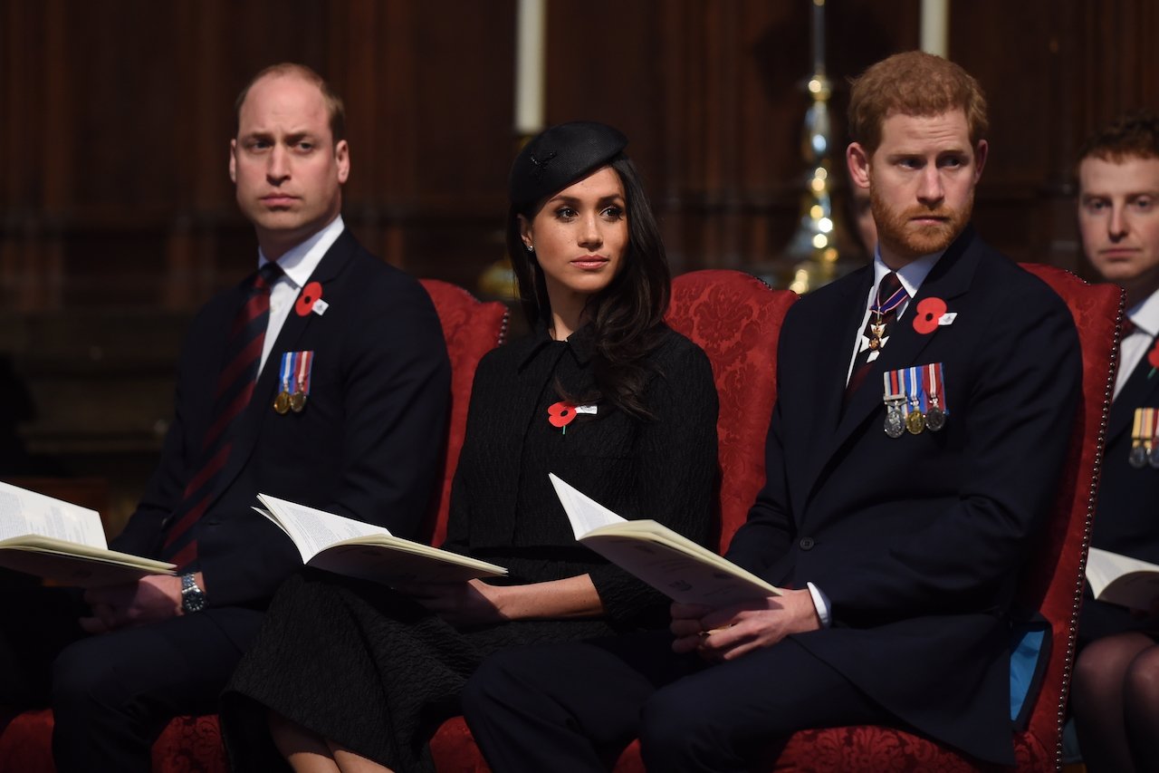 Prince William, Prince of Wales, Meghan Markle, Duchess of Sussex, and Prince Harry, Duke of Sussex, attend an Anzac Day service at Westminster Abbey on April 25, 2018, in London, England.