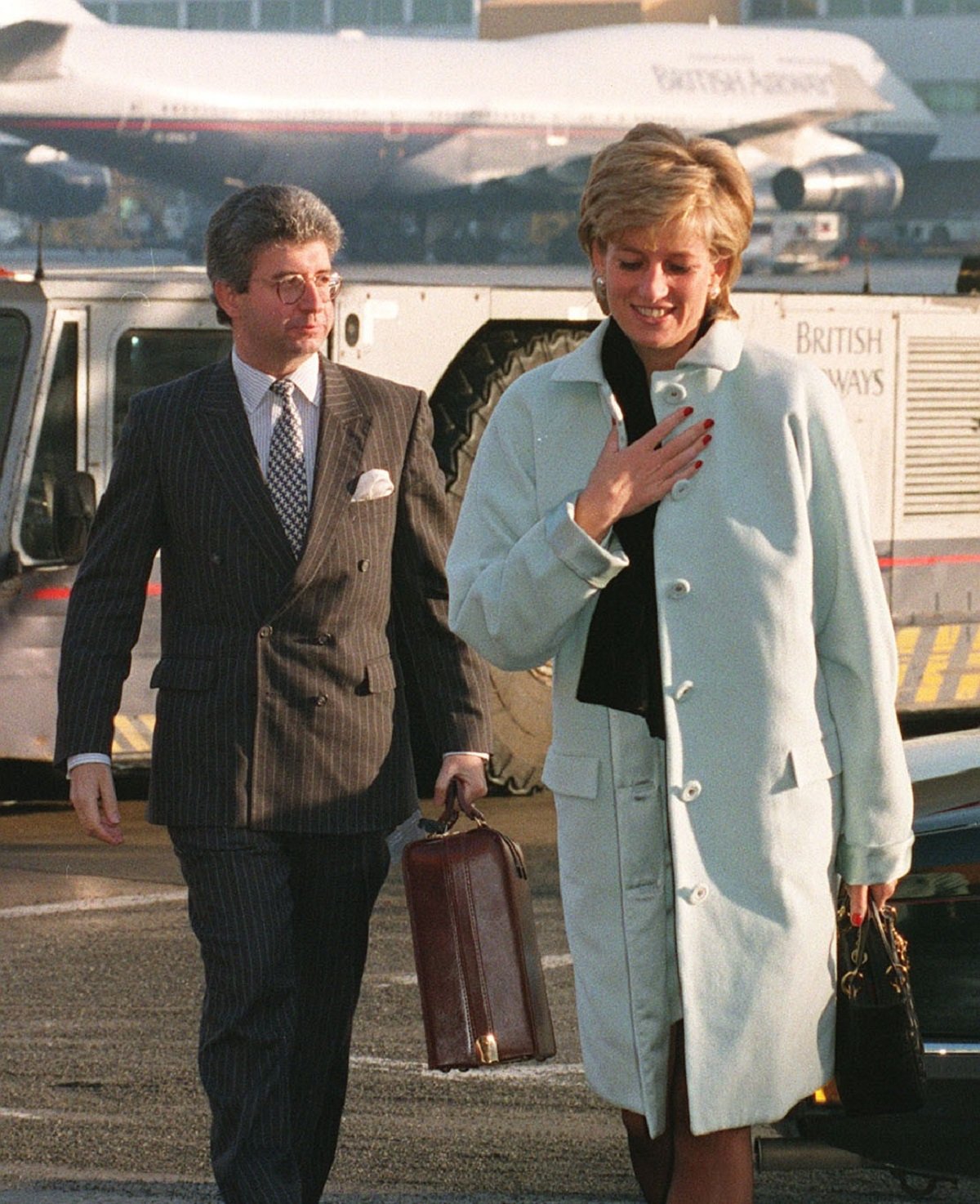 Princess Diana and her private secretary, Patrick Jephson, at Heathrow Airport