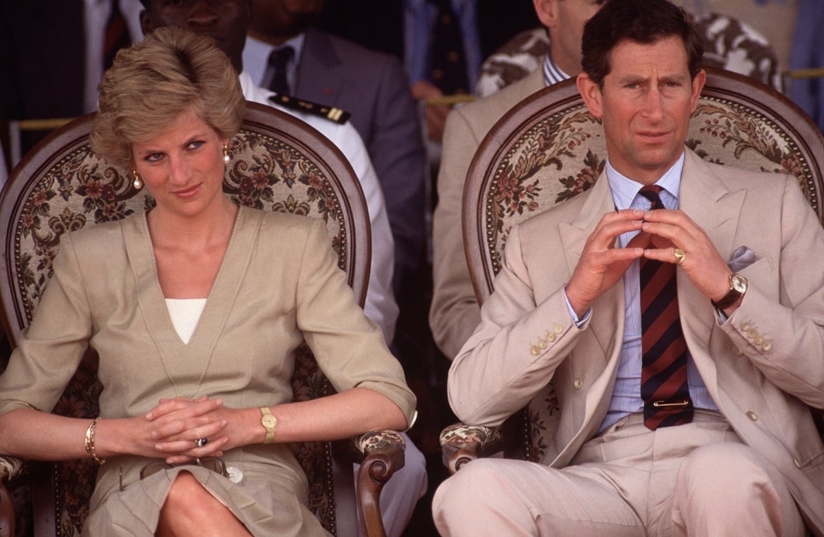 Princess Diana and then-Prince Charles, whose relationship have been covered in a number of films, watching dancing display during royal tour of Cameroon