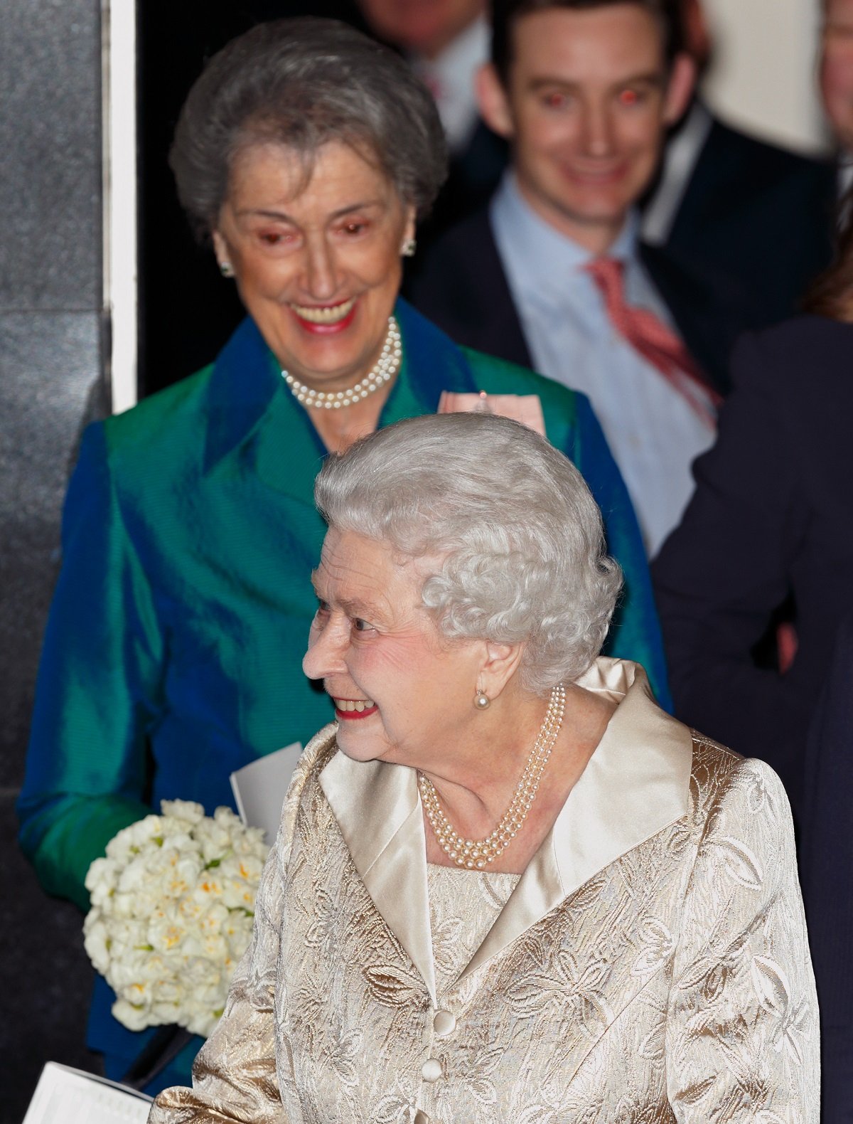 Queen Elizabeth II accompanied by her Lady-in-Waiting Lady Susan Hussey as they depart the Gold Service Scholarship awards ceremony in London