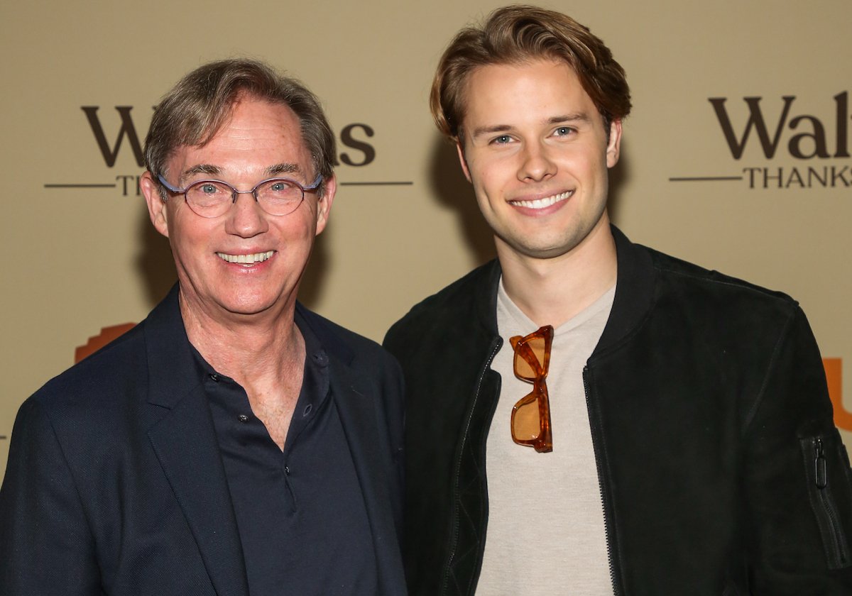 Richard Thomas and Logan Shroyer posing for a photo at 'A Waltons Thanksgiving' premiere