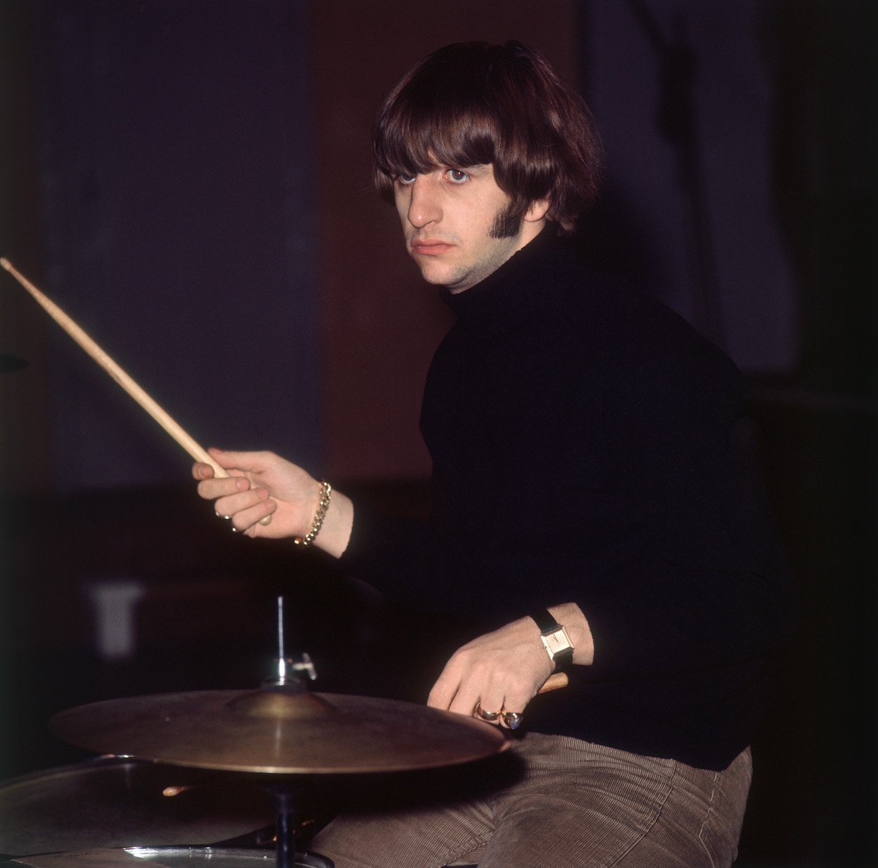 Ringo Starr, who changed drumming forever with his playing style according to a Rock & Roll Hall of Fame member, rehearses in 1966.