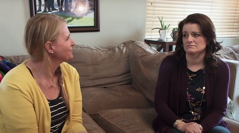 Christine Brown and Robyn Brown sit on a couch together and talk on 'Sister Wives' on TLC.