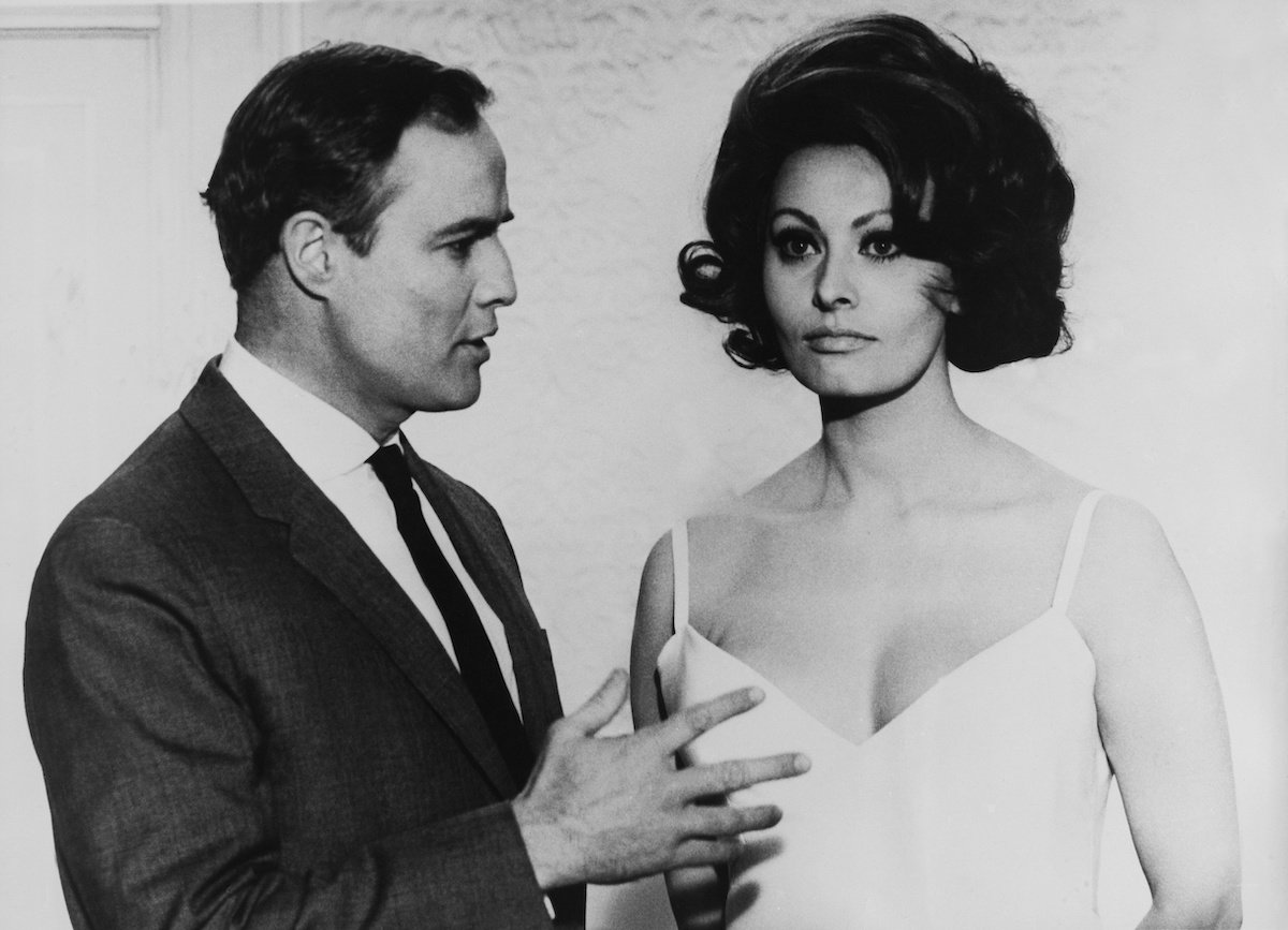 Sophia Loren (R) and Marlon Brando (L), in black and white, 1966