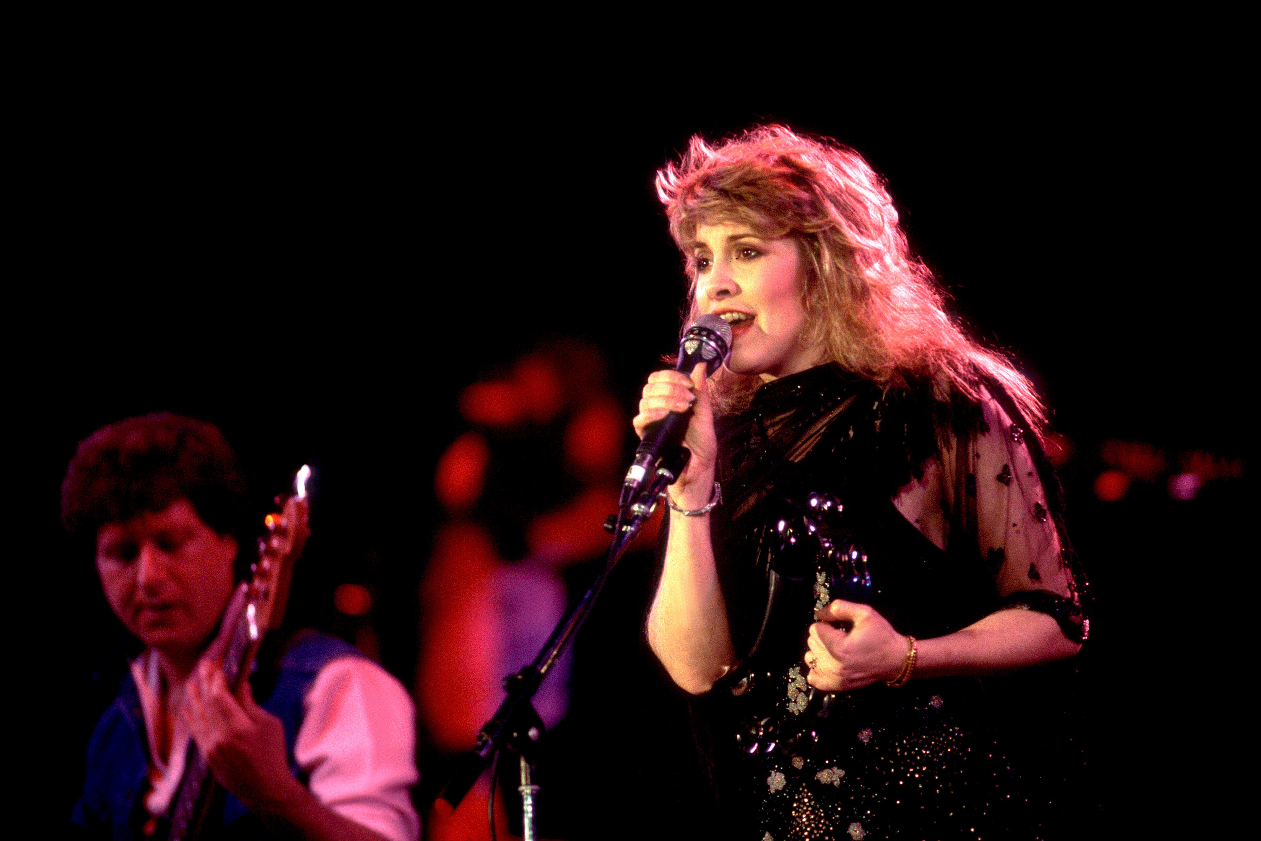 Fleetwood Mac's Stevie Nicks with a microphone