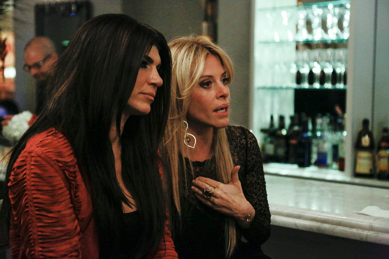 Teresa Giudice and Dina Manzo chat during 'RHONJ' filming; Manzo and Giudice reportedly had a falling out