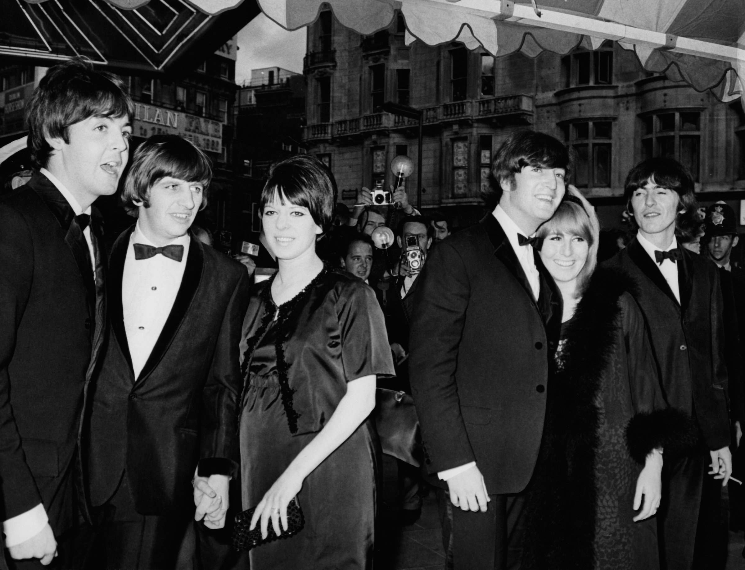 The Beatles, left to right, Paul McCartney, Ringo Starr with his wife Maureen, John Lennon with wife Cynthia and George Harrison