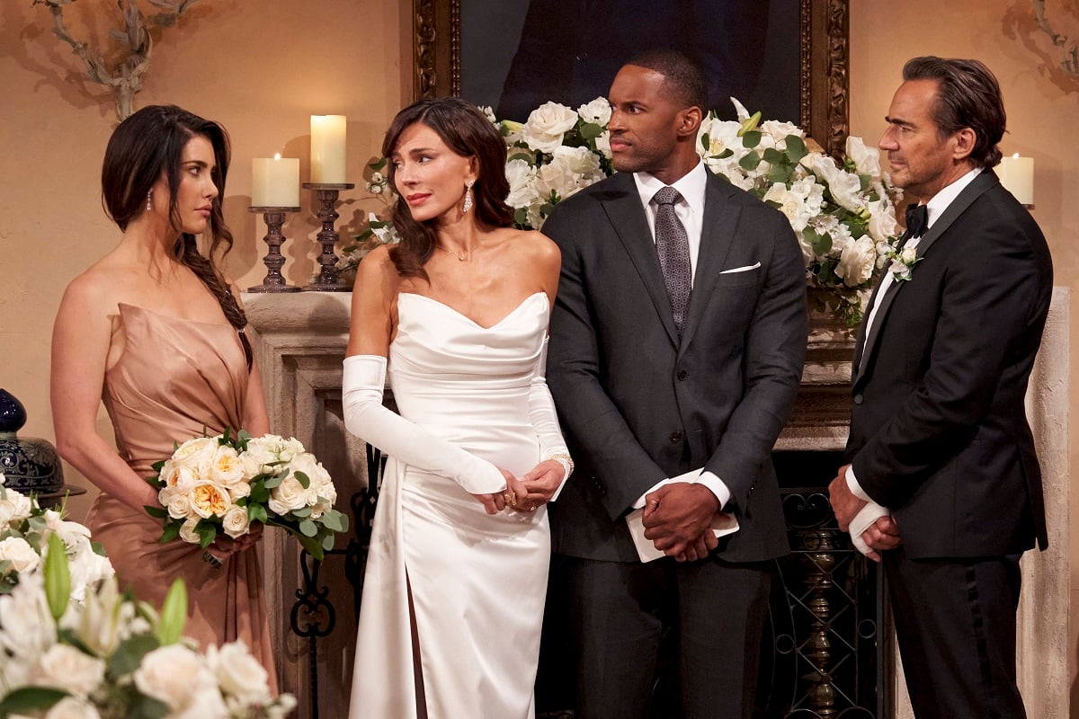 'The Bold and the Beautiful' stars Jacqueline MacInnes Wood, Krista Allen, Lawrence Saint-Victor, and Thorsten Kaye in a wedding scene from the soap opera.