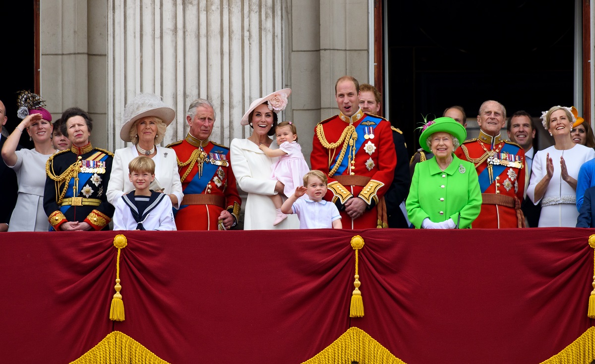 The British royal family watching a fly past from the Buckingham Palace balcony during the Trooping the Colour