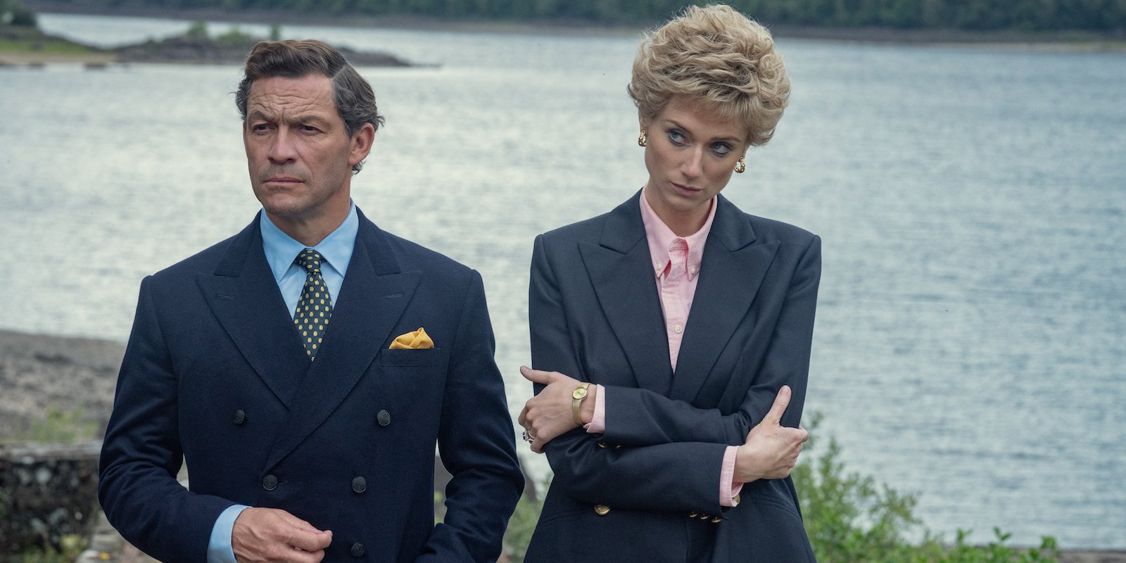 'The Crown' Season 5: Princess Diana (Elizabeth Debicki) stands with her arms folded next to Prince Charles (Dominic West)